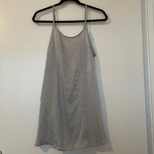 Urban outfitters slip open back dress. Size small. Color light grey metallic.